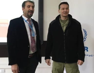 Miniatura: Ciężkie buty i ubranie w kolorze khaki....