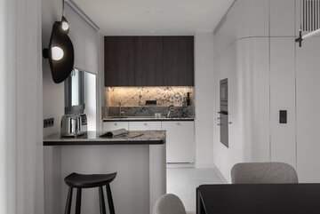Dwupoziomowy apartament w&nbsp;inwestycji Chronos na&nbsp;warszawskiej Woli, projekt Moderna Design
