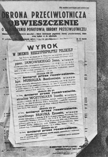 Obwieszczenie o wykonaniu kary śmierci na dezerterach i dywersantach Ostatni wymieniony, o niemiecko brzmiącym nazwisku, miał przy użyciu latarki oznaczać dla wrogiego lotnika cel. Został stracony za szpiegostwo