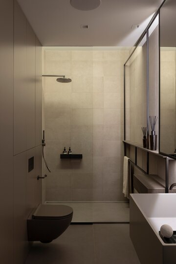 Apartament na warszawskim Mokotowie zaprojektowany przez VIA NOVA – przykład soft architecture, w której technologia KNX, stonowana paleta taupe i konsekwencja materiałowa budują ponadczasowy klimat 