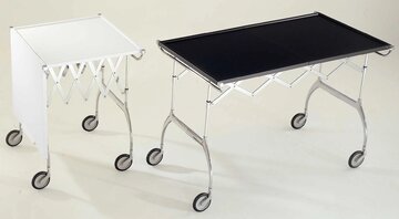 Battista, projekt Antonio Citterio i&nbsp;Olivera L&ouml;wa dla&nbsp;marki Kartell. Mobilny w&oacute;zek i&nbsp;składany stolik łączy funkcjonalność z&nbsp;charakterystyczną dla&nbsp;projektant&oacute;w oszczędną formą