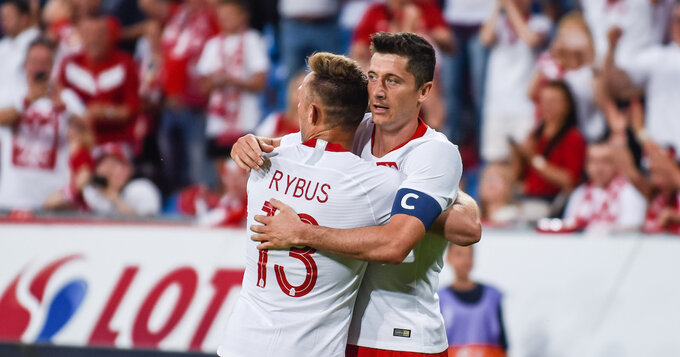 Robert Lewandowski, Maciej Rybus