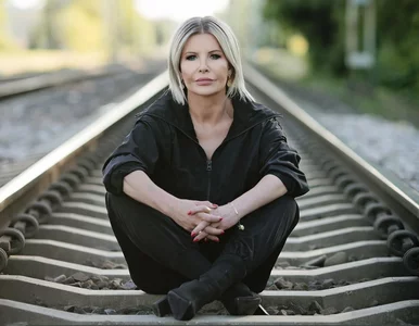 Miniatura: Joanna Racewicz: Spod kurtki wypadło jej...