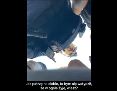 Miniatura: Spięcie między protestującym a policjantem...