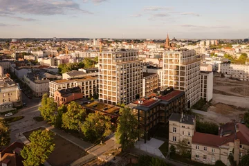 Nowy Port w Bydgoszczy to otwarty kwartał miejski z zabudową mieszkaniowo-usługową, bulwarem nad Brdą i wysokiej jakości przestrzeniami publicznymi zaprojektowanymi przez BBGK Architekci 