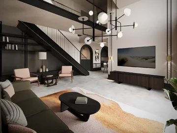 Dwukondygnacyjny salon – bez wątpienia najbardziej okazałe wnętrze domu. Atmosferę nieskrępowanej wakacyjnej swobody podkreśla tu już sama wysokość pomieszczenia, a w krok za nim przeszklona ściana oraz antresola towarzysząca schodom 