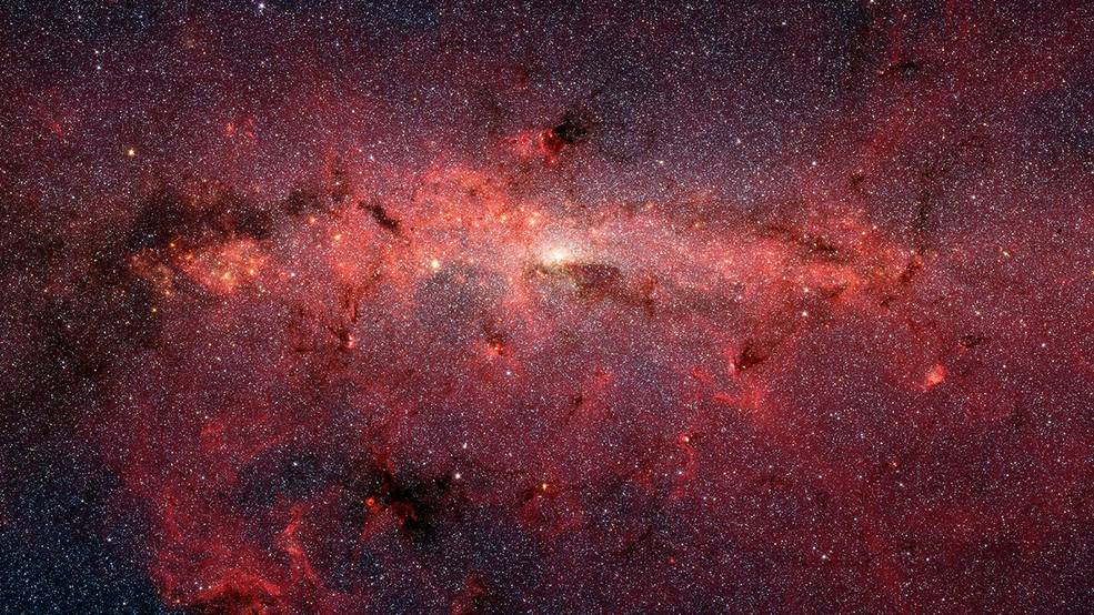 Setki tysięcy zatłoczonych gwiazd w wirującym jądrze Mlecznej Drogi 