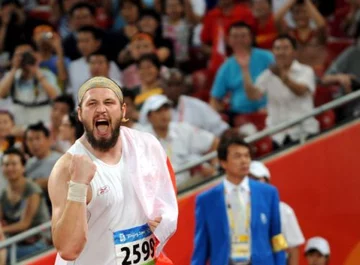 Tomasz Majewski po zdobyciu złotego medalu. Fot. EPA/PAP