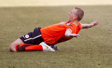 KGHM Zagłębie Lubin - Wisła Kraków 2:2. Adam Banaś miał powody do radości - strzelił bramkę, a jego drużyna zdołała urwać punkt mistrzom Polski (fot. PAP/Maciej Kulczyński)