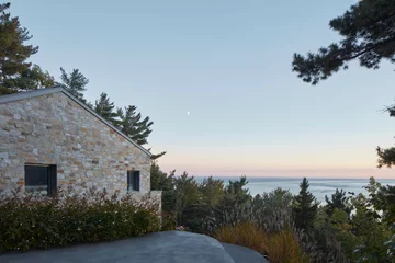 Dom na stromej działce, projekt Atelier Carle 