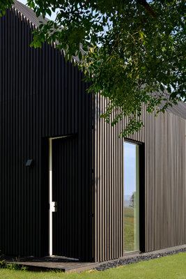 Miniatura: Drewniany dom projektu Bushman Dreyfus...