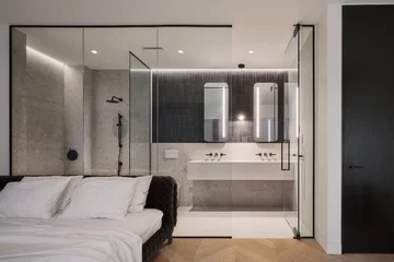 Dwupoziomowy apartament z kuchnią w kolorze miedzi Projekt: MU Architecture 