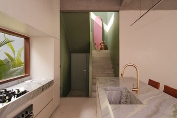 Dom w Seseh na Bali zaprojektowany przez Olgę Kurek z Amok Architecture. Wnętrze łączy surowy beton, naturalny kamień, drewno i tropikalną roślinność 