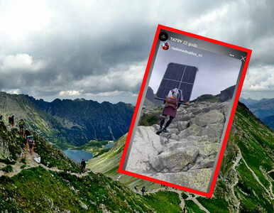 Turysta z panelem fotowoltaicznym na tatrzańskim szlaku