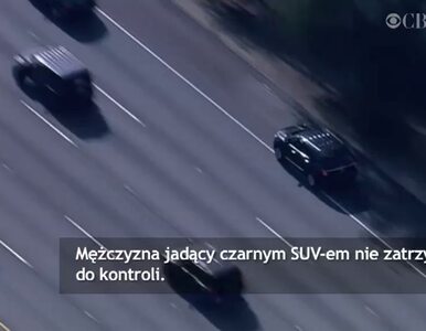 Miniatura: Pościg w godzinach szczytu. Czarny SUV...