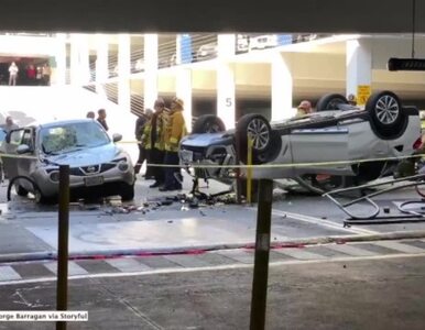 Miniatura: BMW spadło z trzeciego piętra parkingu....