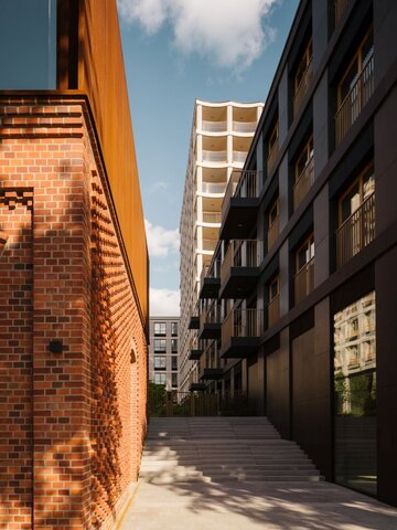 Nowy Port w Bydgoszczy to otwarty kwartał miejski z zabudową mieszkaniowo-usługową, bulwarem nad Brdą i wysokiej jakości przestrzeniami publicznymi zaprojektowanymi przez BBGK Architekci 