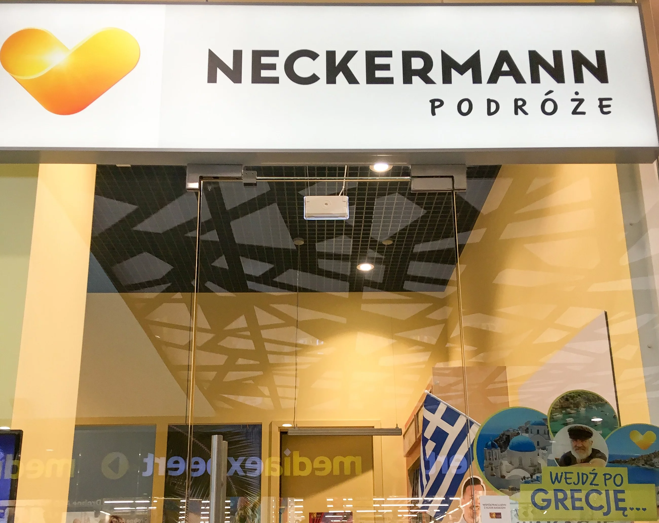 Logo biura Neckermann