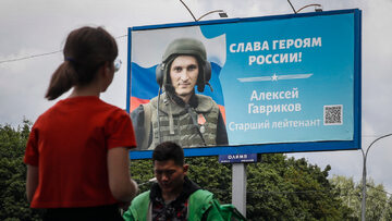 Billboard z rosyjskim żołnierzem w Moskwie