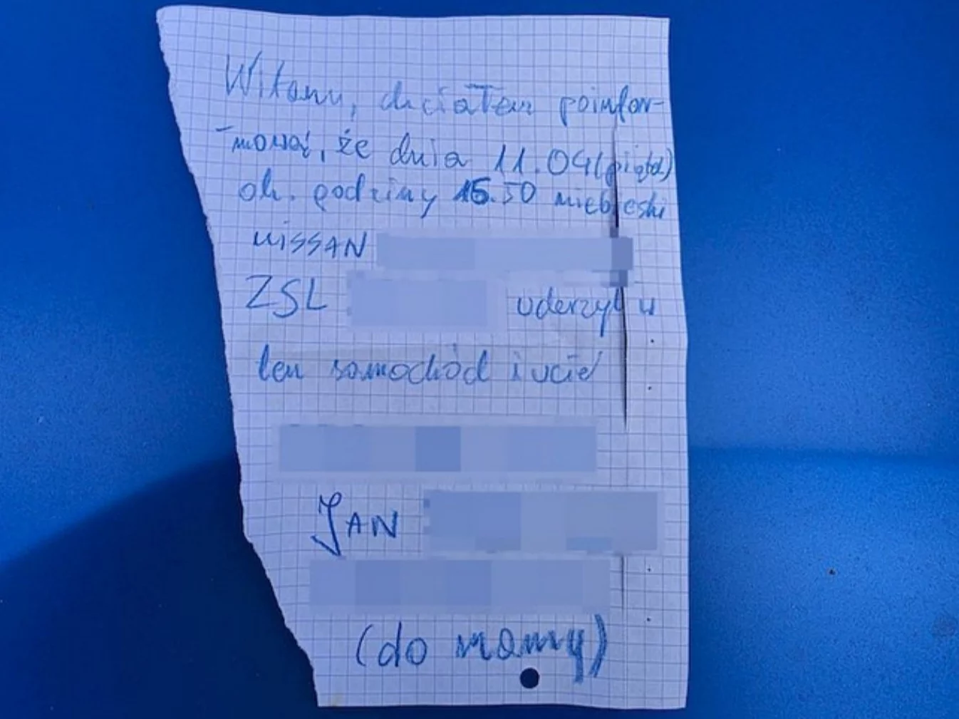 Kartka zostawiona za wycieraczką