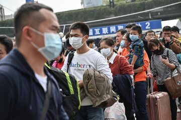 Chińczycy chroniący się przed koronawirusem