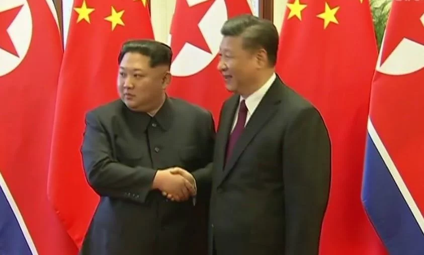 Kim Dzong Un i Xi Jinping