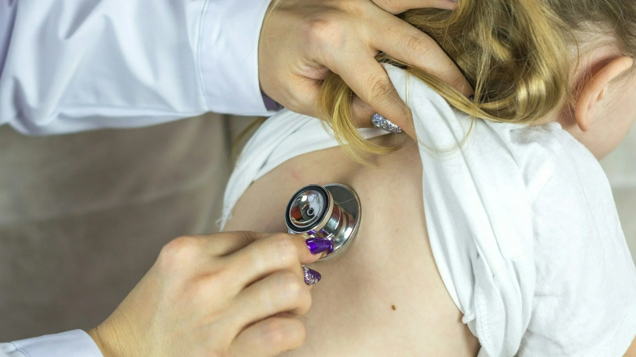 Doctor and patient on preventive examination. Medicine to children