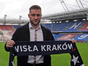 Jakub Błaszczykowski z szalikiem Wisły Kraków