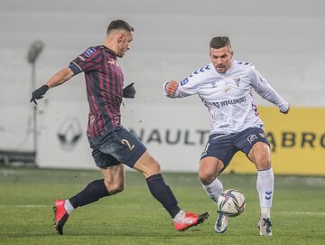 Lukas Podolski w meczu z Pogonią Szczecin