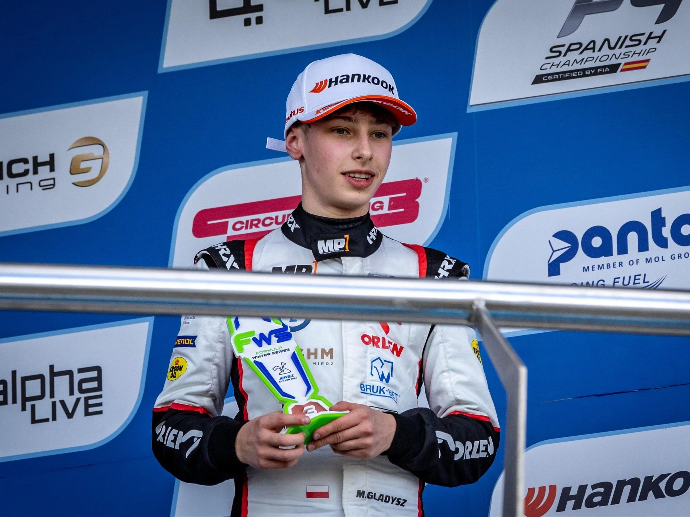 Maciej Gładysz na podium Winter Formula Series