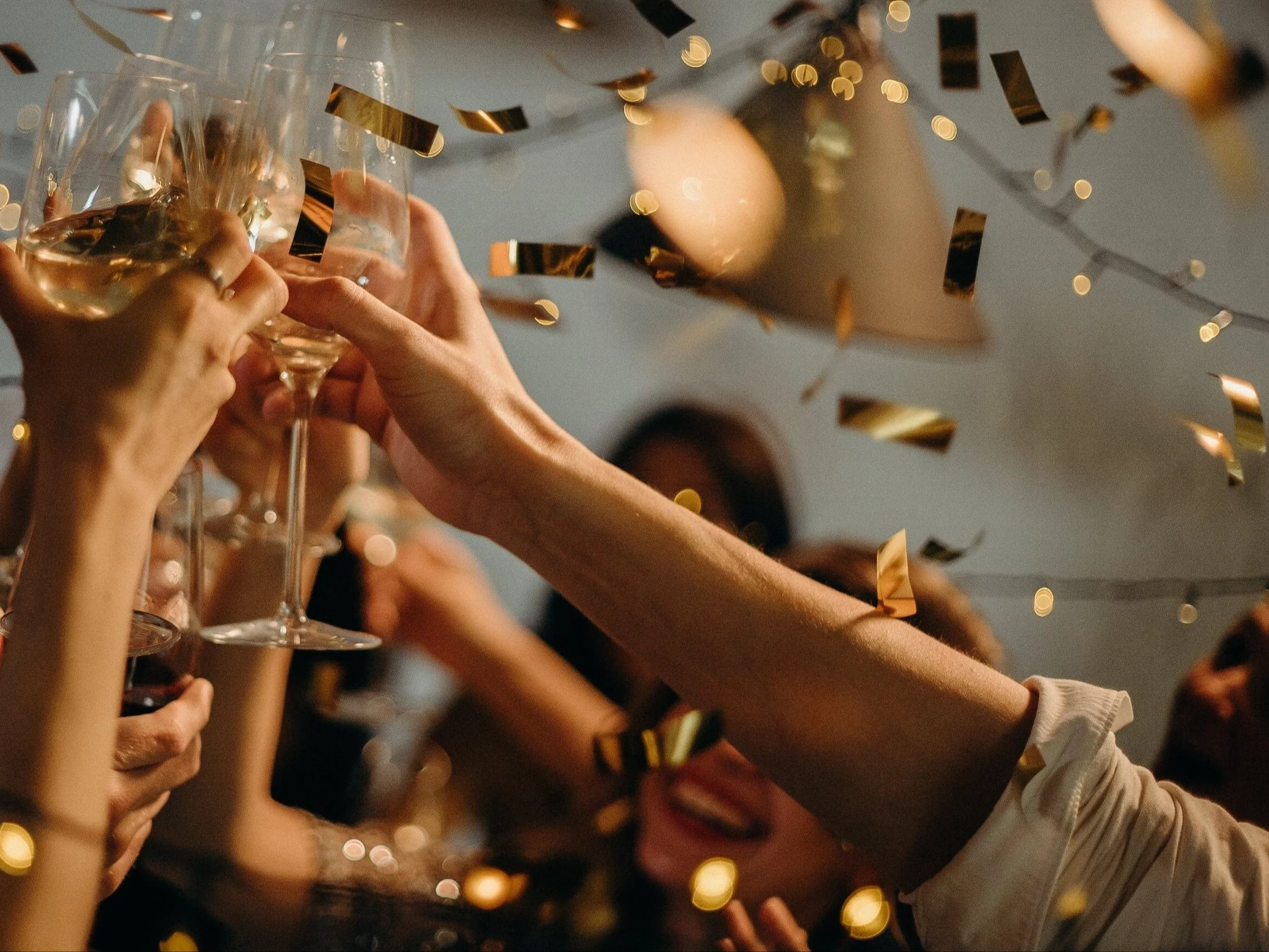 People Toasting Wine Glasses