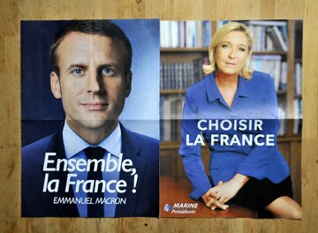 Plakaty wyborcze Emmanuela Macrona i Marine Le Pen