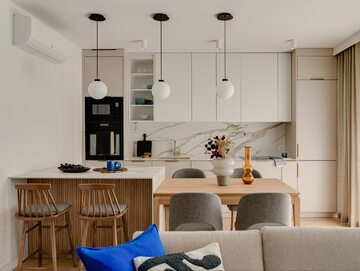 Przytulne mieszkanie dla dwojga zaprojektowane przez Grupa Nono