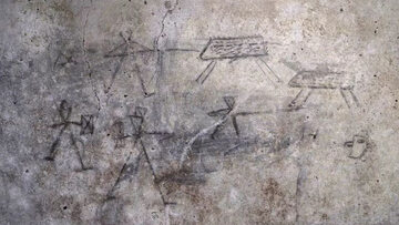 Rysunki gladiatorów w Pompejach wykonane przez dzieci