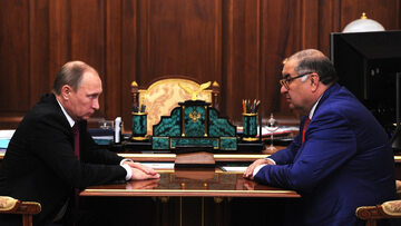Władimir Putin i Aliszer Usmanow w 2015 r.
