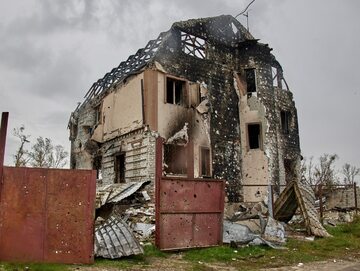 Zniszczony dom w obwodzie charkowskim