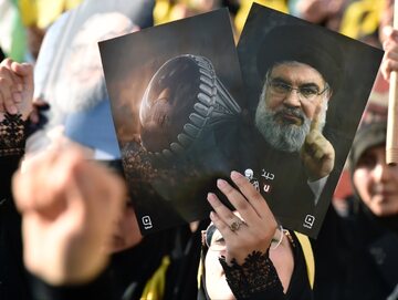 Zwolennicy Hezbollahu podczas przemówienia Nasrallaha